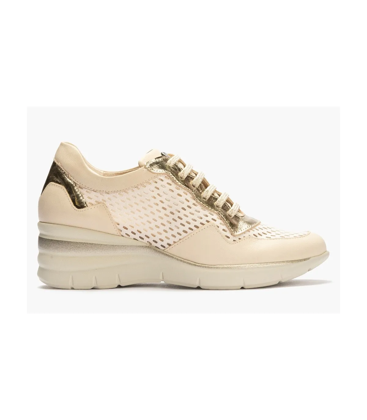 Deportivo de cuña en color crema para mujer