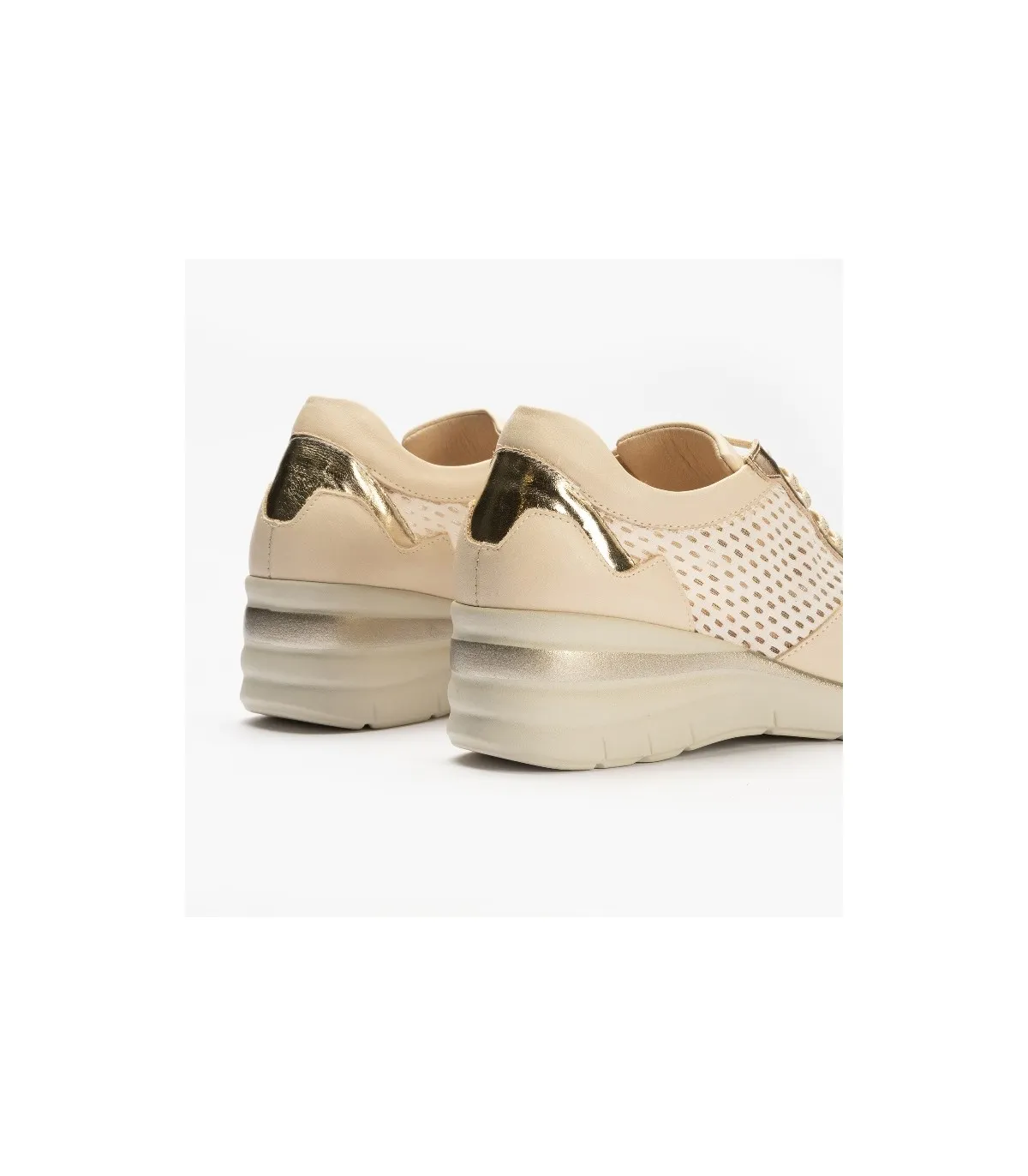 Deportivo de cuña en color crema para mujer
