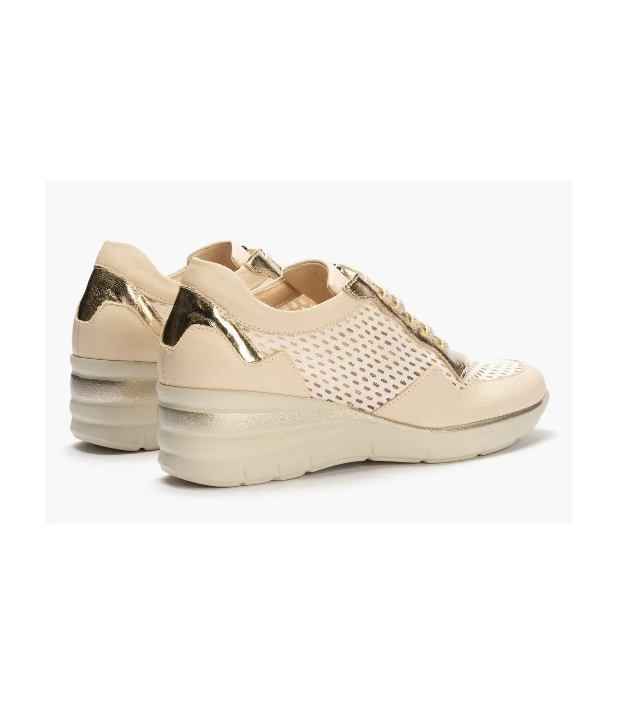 Deportivo de cuña en color crema para mujer