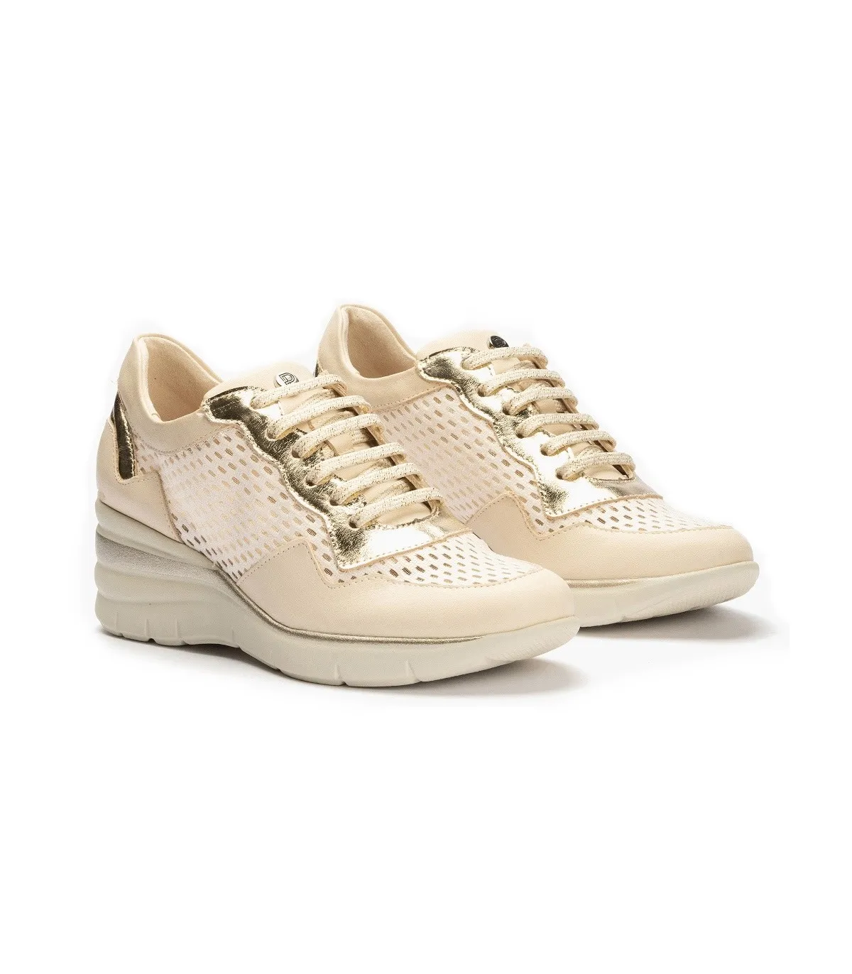Deportivo de cuña en color crema para mujer
