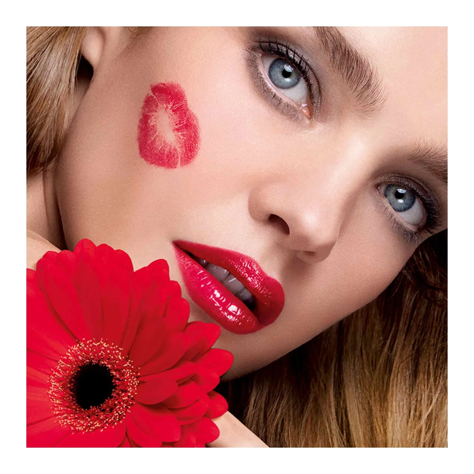 GUERLAIN KISSKISS SHINE BLOOM ROUGE BRILLANTE 95  DE INGREDIENTES DE ORIGEN NATURAL EN   521 KISS TO SAY
