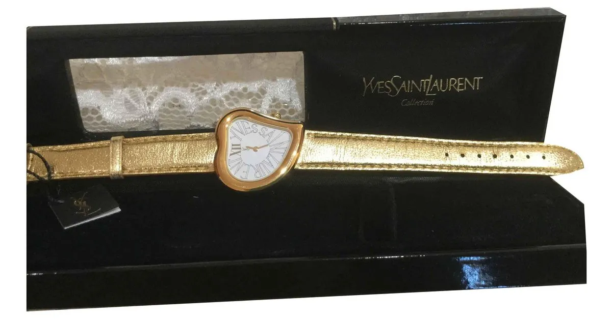 Yves Saint Laurent Cara de corazon Metálico 