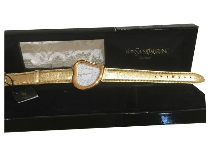 Yves Saint Laurent Cara de corazon Metálico 