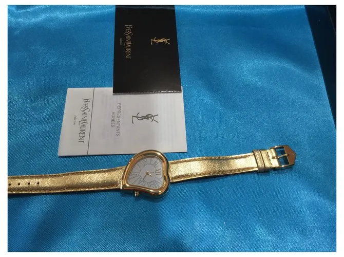 Yves Saint Laurent Cara de corazon Metálico 