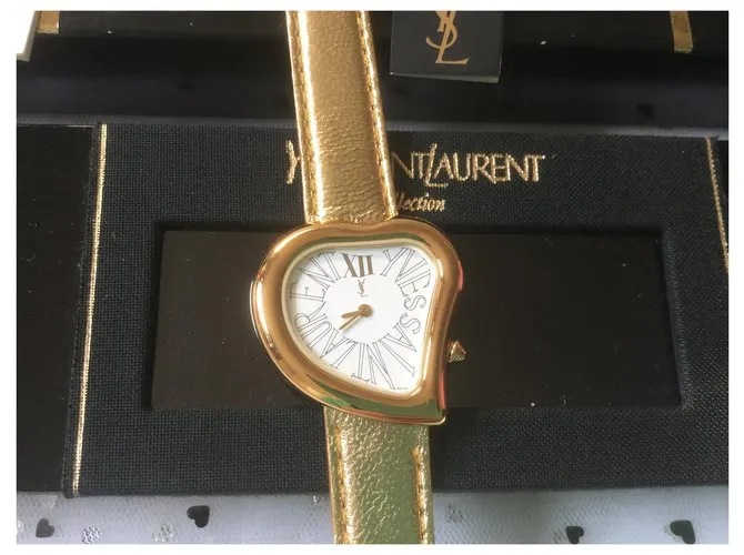 Yves Saint Laurent Cara de corazon Metálico 