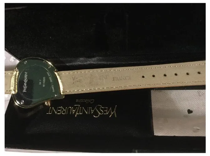 Yves Saint Laurent Cara de corazon Metálico 