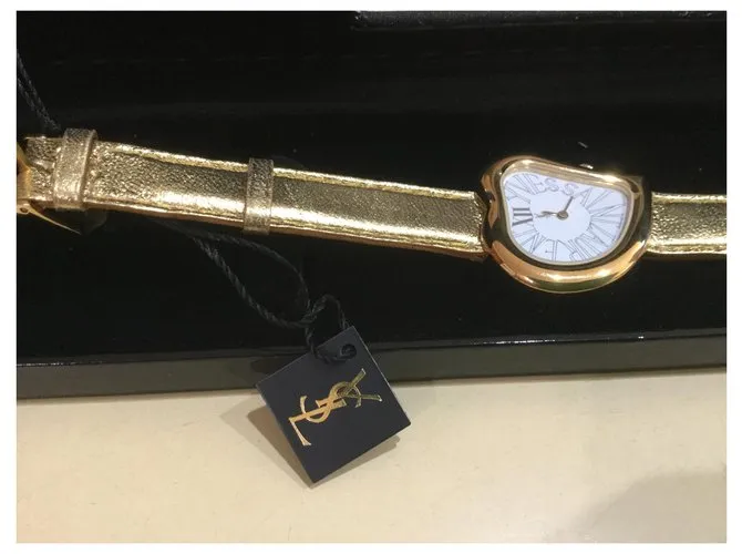 Yves Saint Laurent Cara de corazon Metálico 