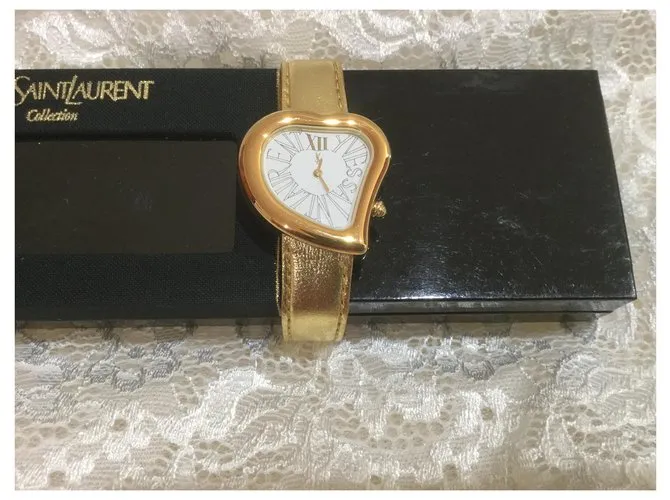 Yves Saint Laurent Cara de corazon Metálico 