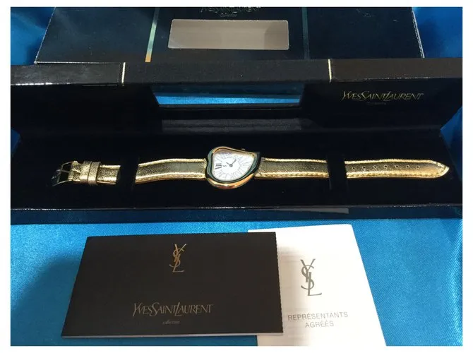Yves Saint Laurent Cara de corazon Metálico 