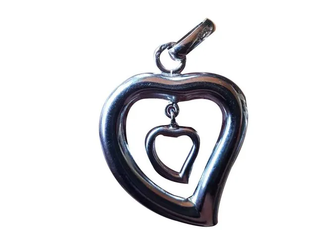 Yves Saint Laurent corazón Plata 