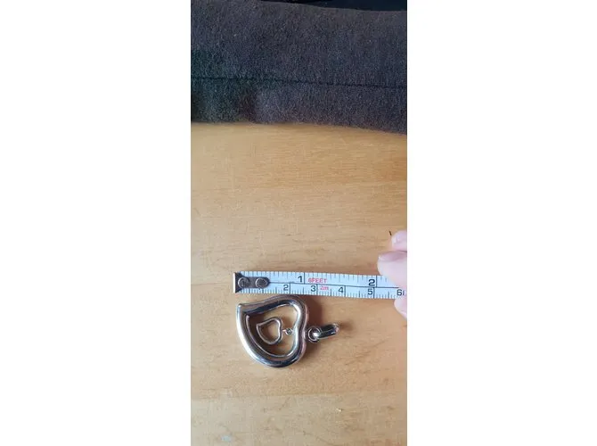 Yves Saint Laurent corazón Plata 