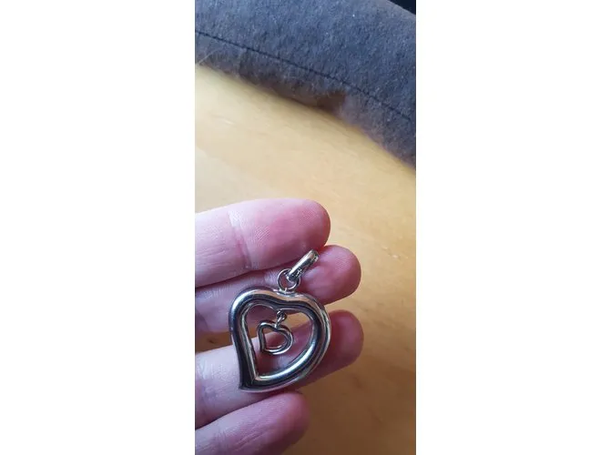 Yves Saint Laurent corazón Plata 