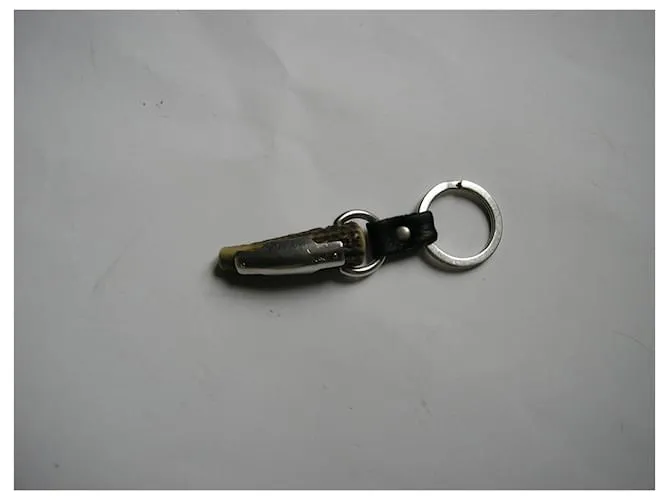 Yves Saint Laurent Llavero Mombasa. Plata 