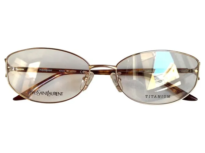 Yves Saint Laurent Monturas de titanio YSL Gold hardware 