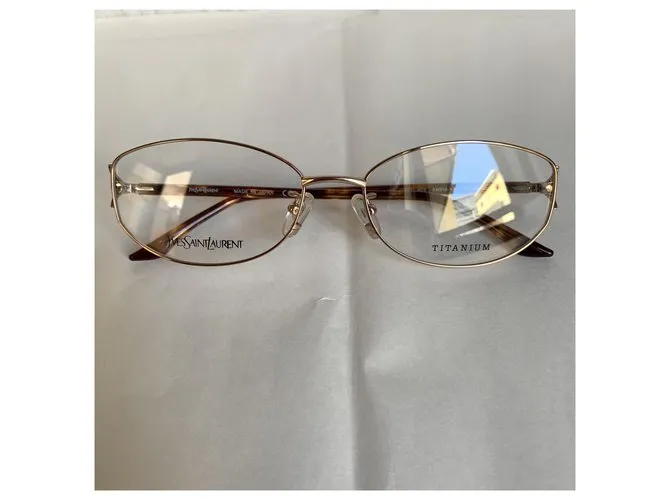 Yves Saint Laurent Monturas de titanio YSL Gold hardware 