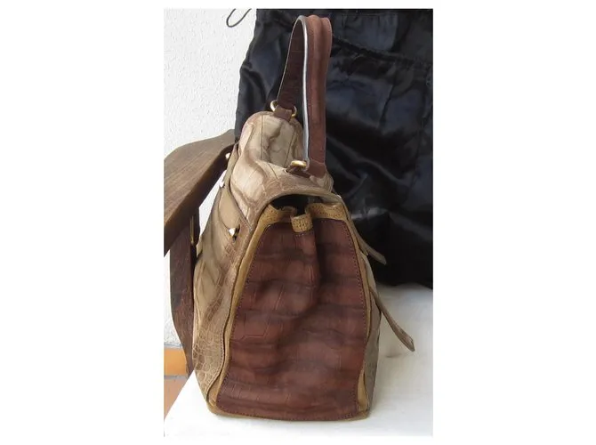 Yves Saint Laurent musa II Castaña 