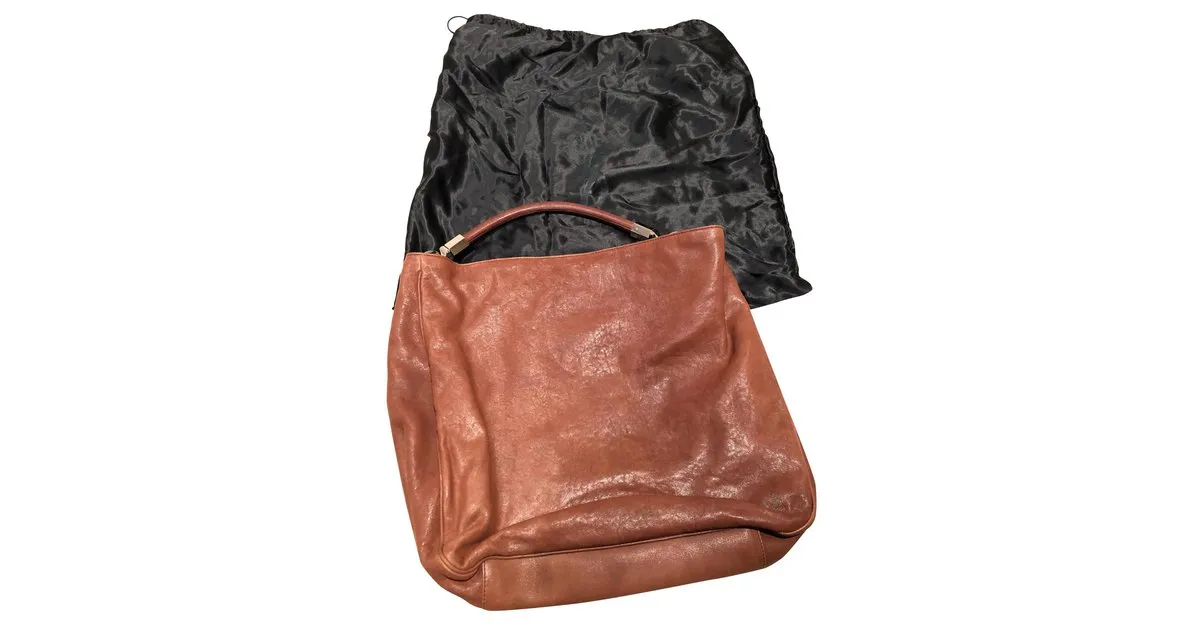 Yves Saint Laurent YSL roady hobo Castaño 