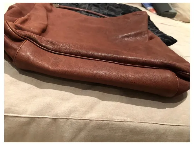 Yves Saint Laurent YSL roady hobo Castaño 