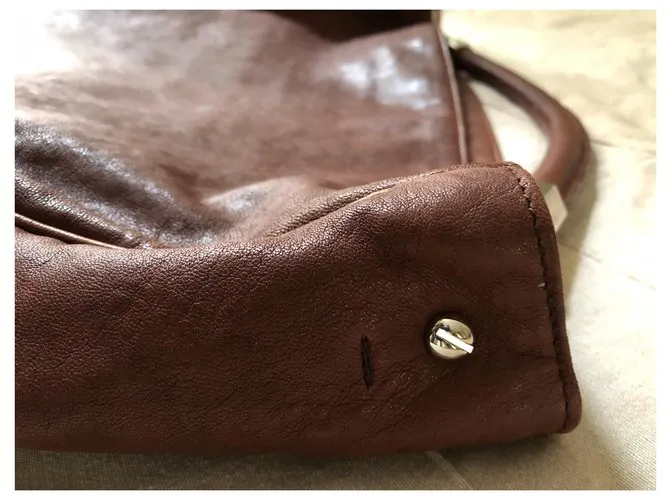 Yves Saint Laurent YSL roady hobo Castaño 