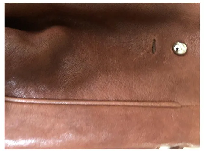 Yves Saint Laurent YSL roady hobo Castaño 