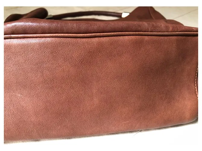 Yves Saint Laurent YSL roady hobo Castaño 